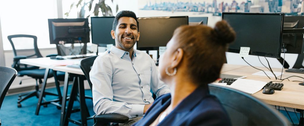 co-workers discussing