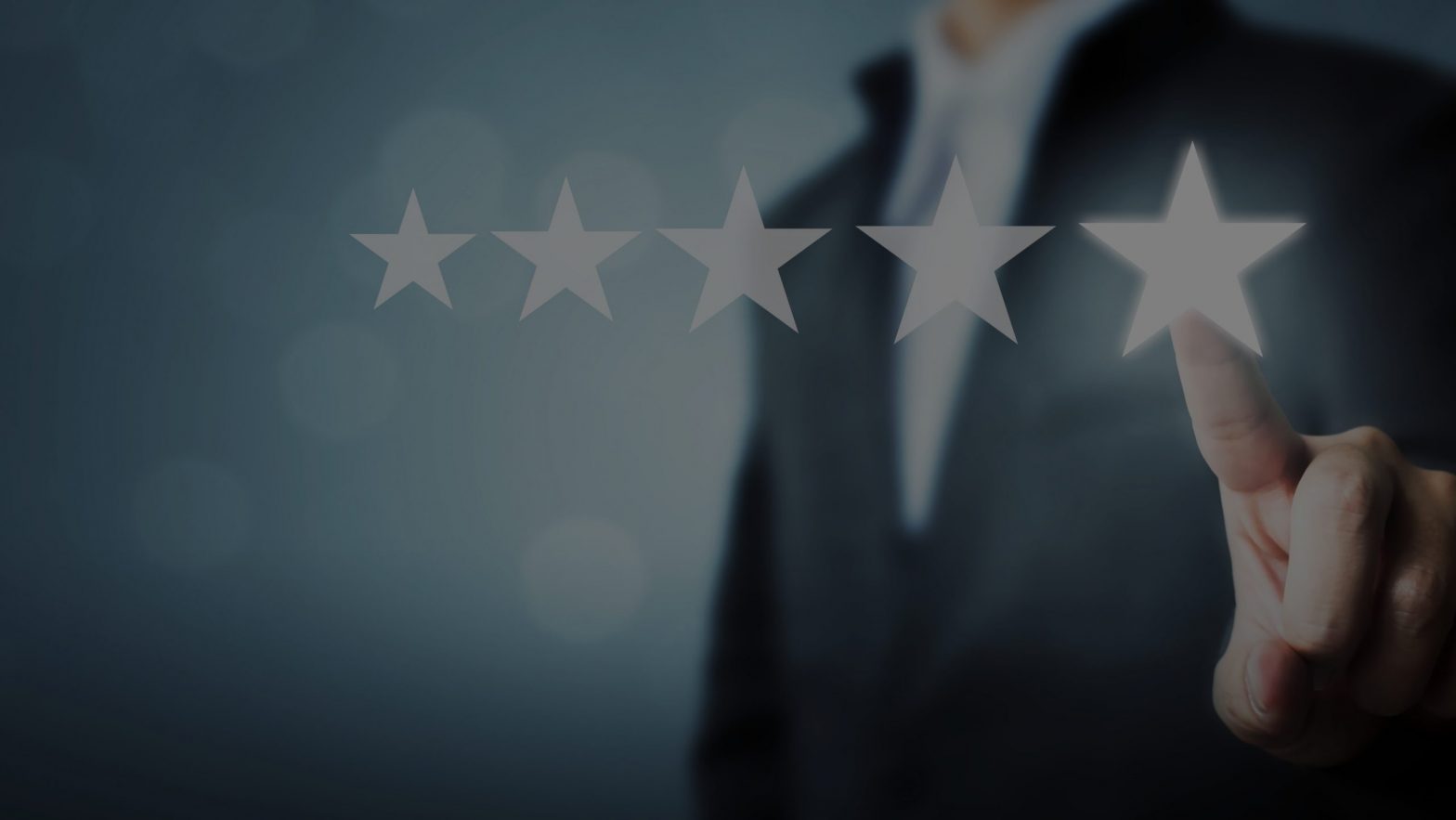 Man clicking on 5 star rating