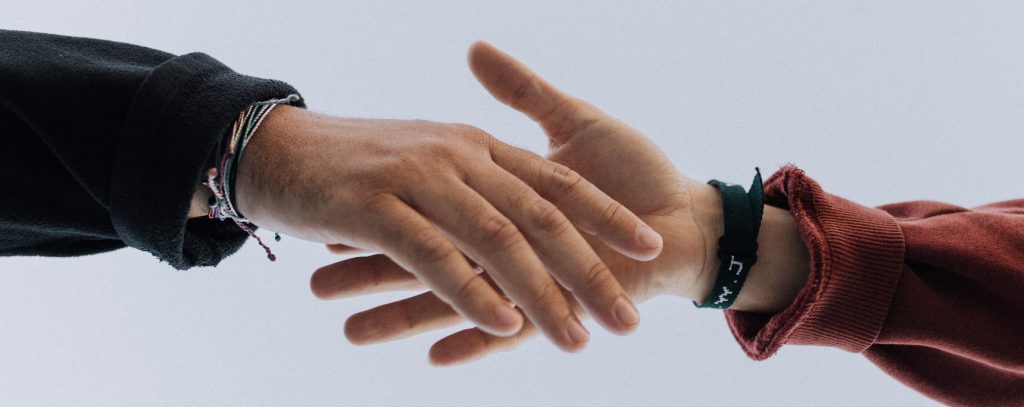 Two hands about to shake